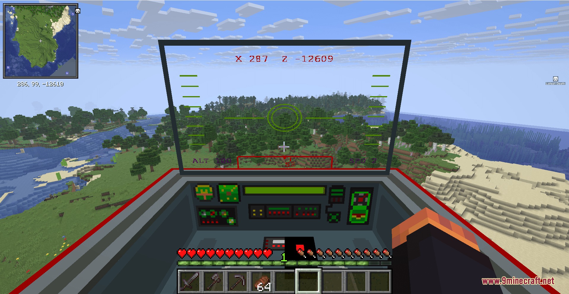 First person view from a helicopter cockpit flying over a green forest