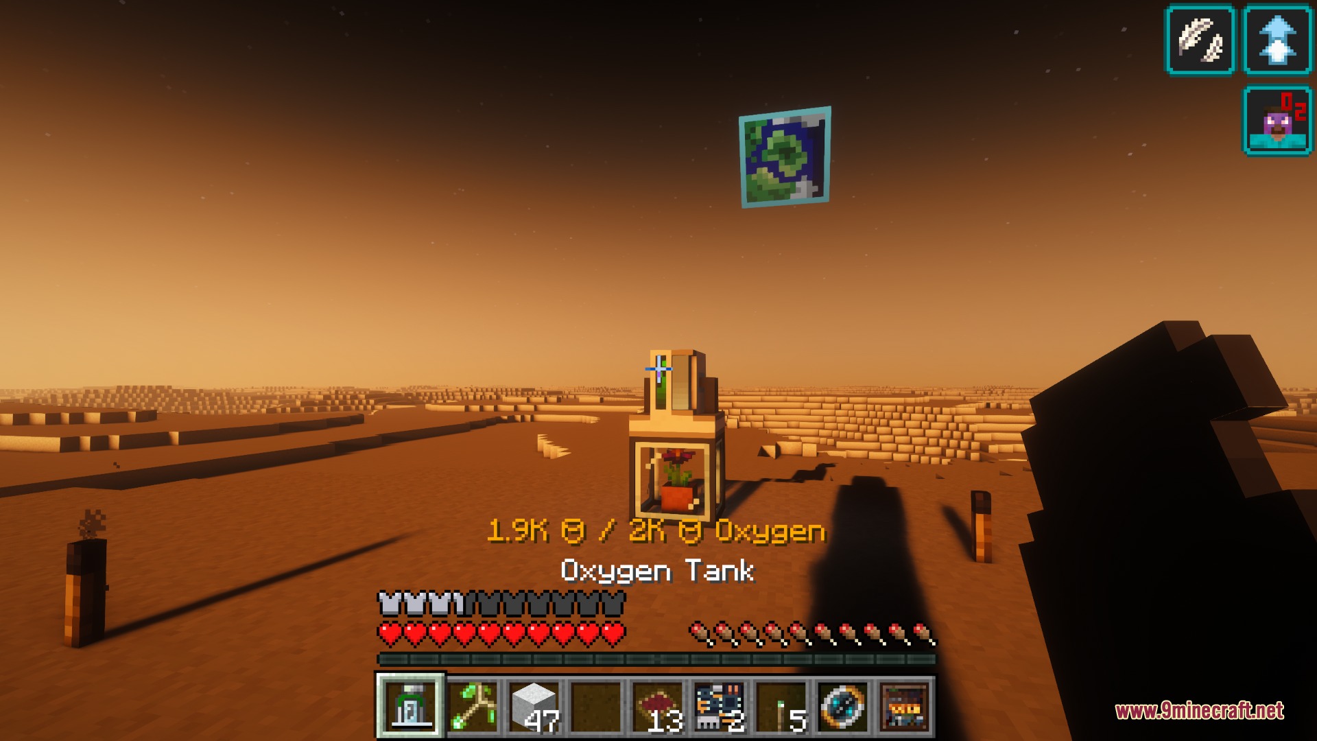 TLOTD Mod Screenshot 2 A player explores a desert planet while using an oxygen tank to breathe