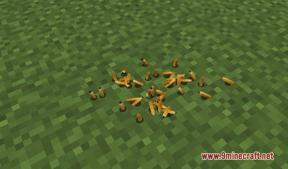 TaCZ Tactical Breaching Mod Screenshot 4 Realistic bullet shell casings lying on the grass in a Minecraft world