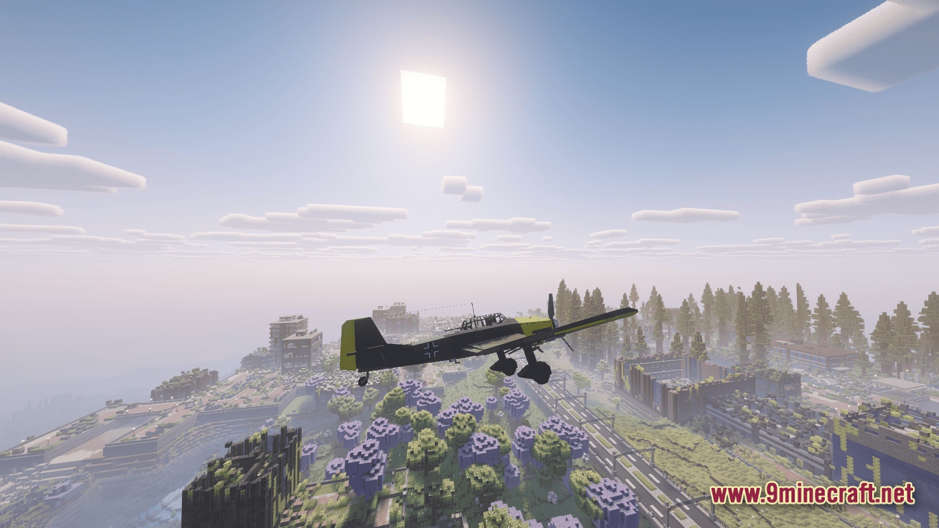 Take A Look GUNS Remasterd Modpack Screenshot 3 A vintage military aircraft flies over a detailed Minecraft city featuring roads, buildings, and purple trees