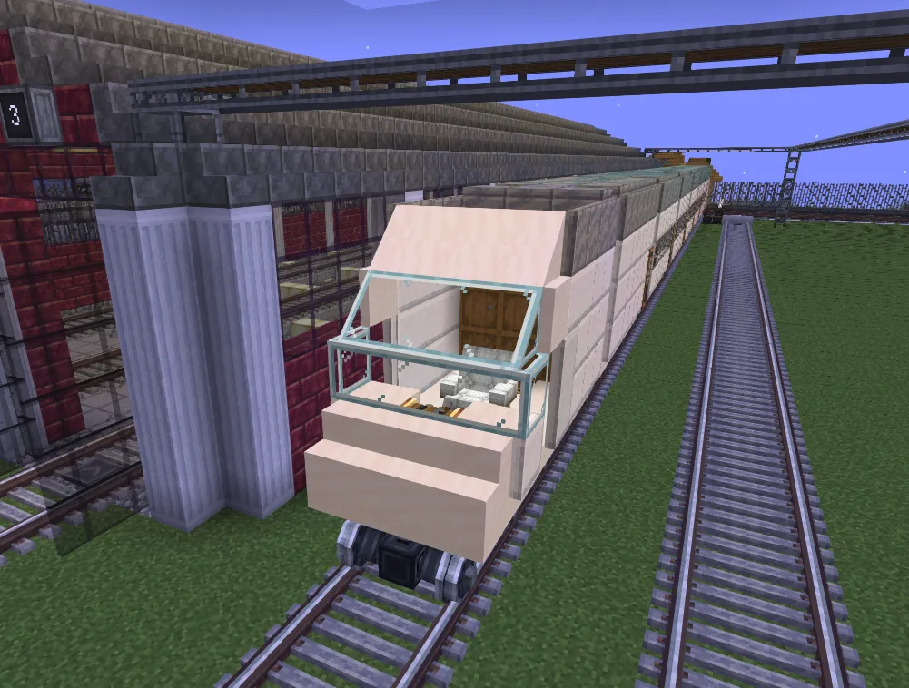 Front view of a white Talgo Bombardier 730 train on tracks