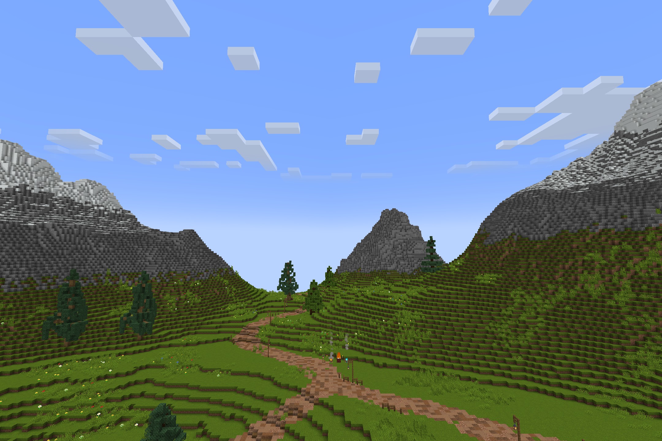 Tazko’s Fresh Textures Resource Pack Screenshot 10 Lush green valley with a winding dirt path and distant mountains