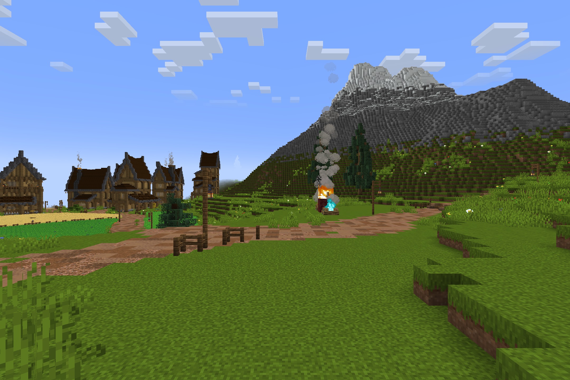 Tazko’s Fresh Textures Resource Pack Screenshot 2 A village with wooden houses and a path leading to a large mountain