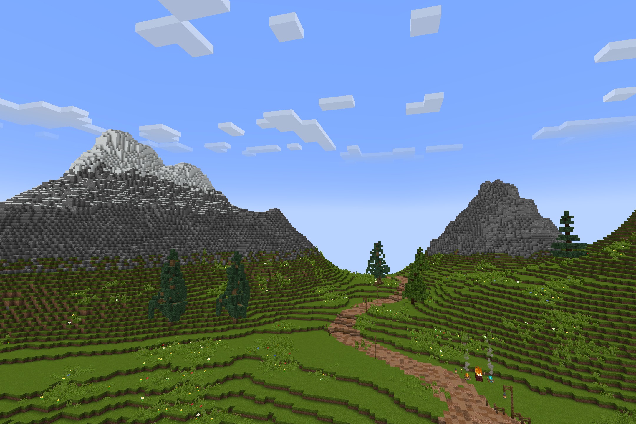 Tazko’s Fresh Textures Resource Pack Screenshot 6 Vibrant green hills and a winding path leading toward snowy mountain peaks