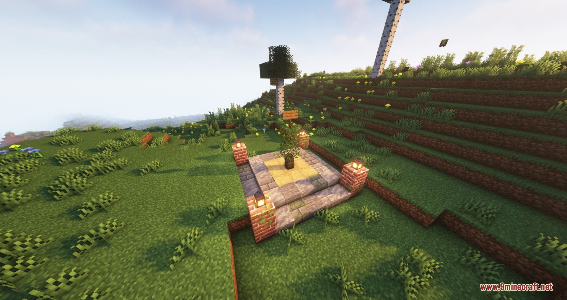 Telepost Mod Screenshot 5 A stone and brick teleport post with a sign on a grassy hill