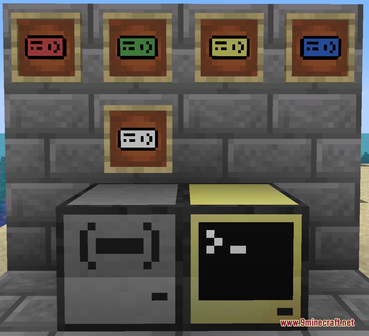 A computer terminal and card reader block with various colored data cards