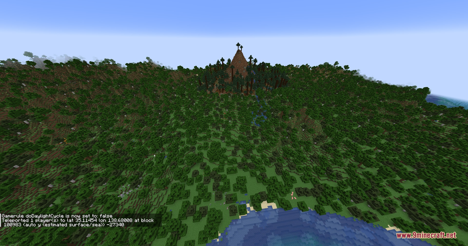 Terrarium Expanded Mod Screenshot 2 Dense forest landscape featuring a tall mountain peak under a clear sky