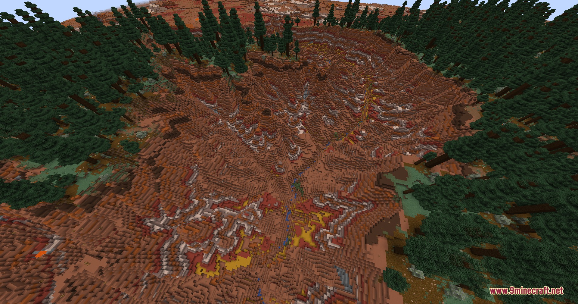 Terrarium Expanded Mod Screenshot 8 A deep canyon with red rock layers surrounded by tall pine trees