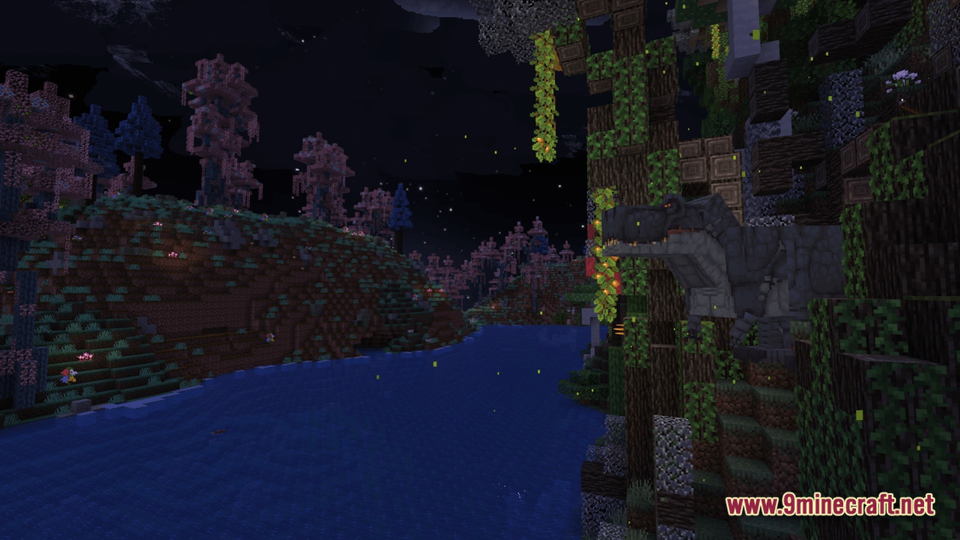 A large predatory dinosaur stands on a forested riverbank under a starry night sky