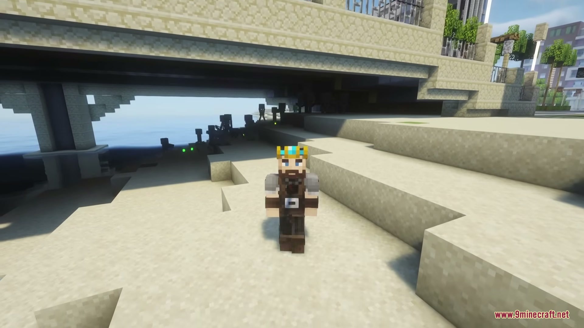 The Boys Unbalanced Mod Screenshot 2 Crowned Minecraft character stands on sand in the shade of a bridge