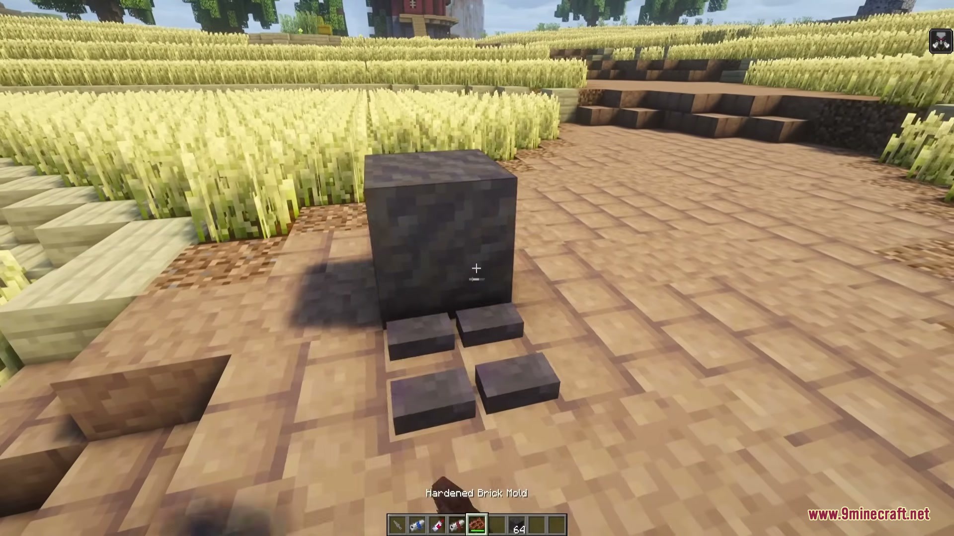 Using a hardened brick mold to create raw bricks in the world