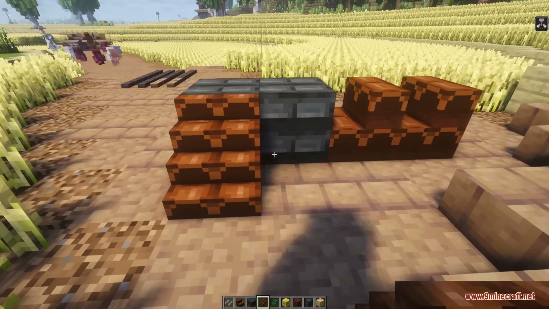 An extruder machine cutting clay blocks into raw bricks and roof tiles