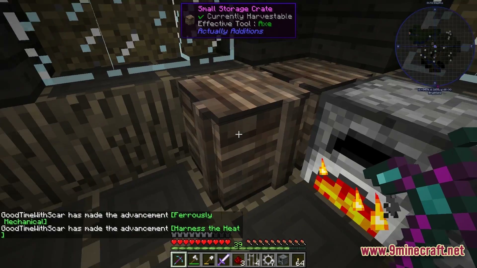 The Fool Modpack Screenshot 4 A player looks at a Small Storage Crate next to an active furnace inside a base
