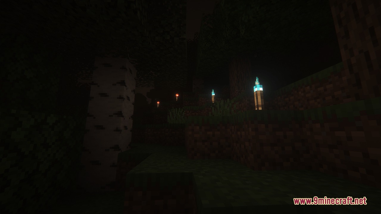 Blue soul torches and orange torches glow in a dark Minecraft forest