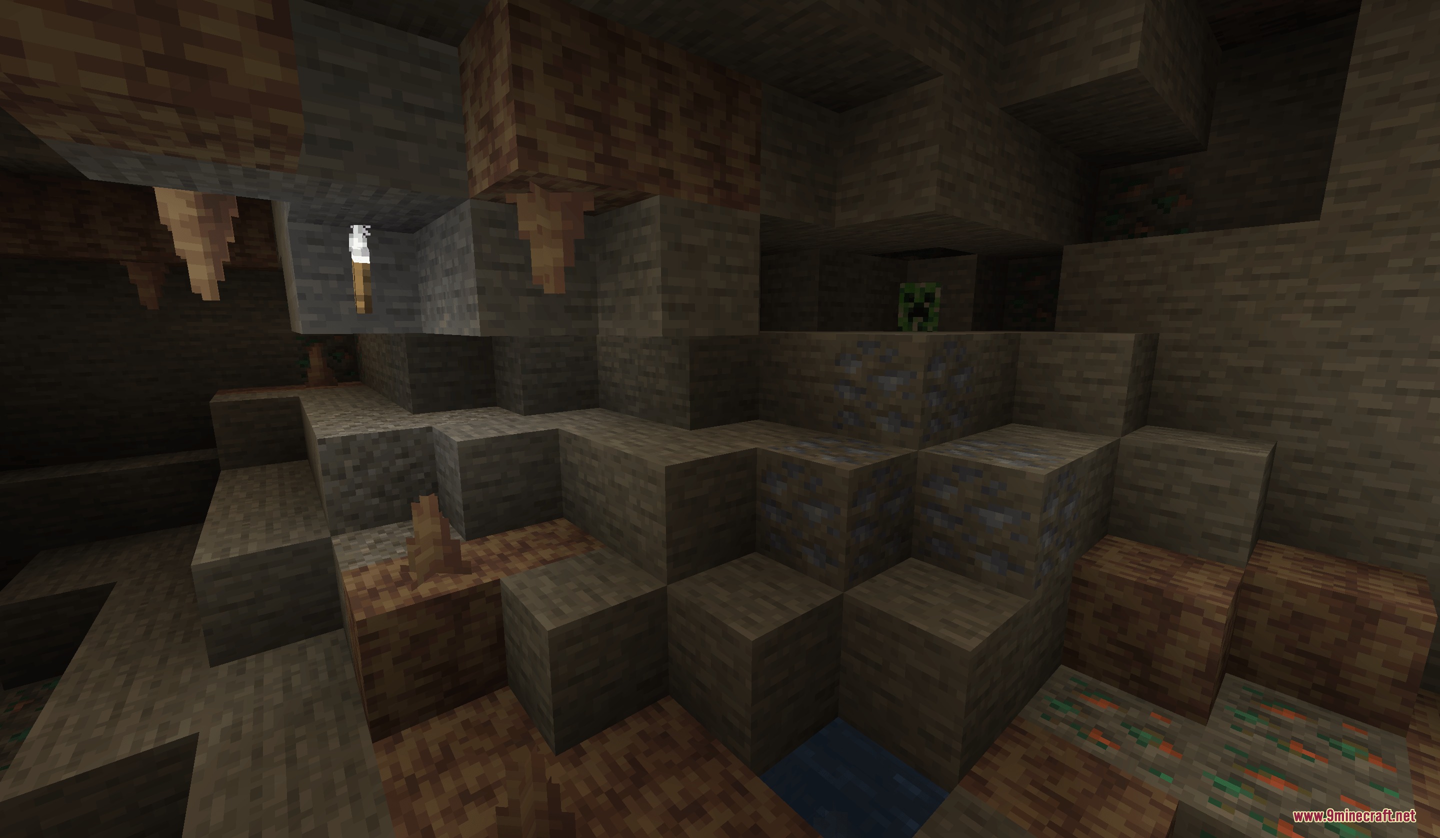 The Lead Age Mod Screenshot 8 A hostile creeper hides among stone blocks and lead ore veins inside a cave