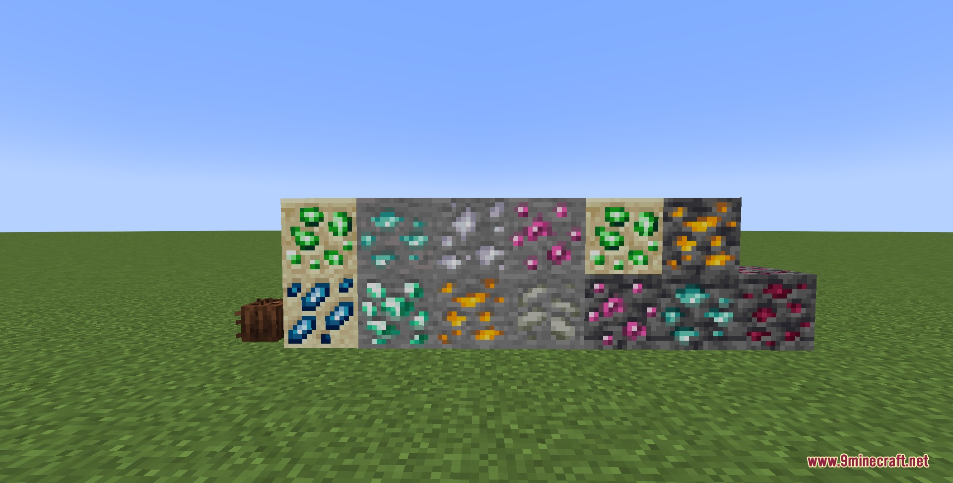 The Mango New Advent Mod Screenshot 8 A collection of new mineral ores placed on the grass for display