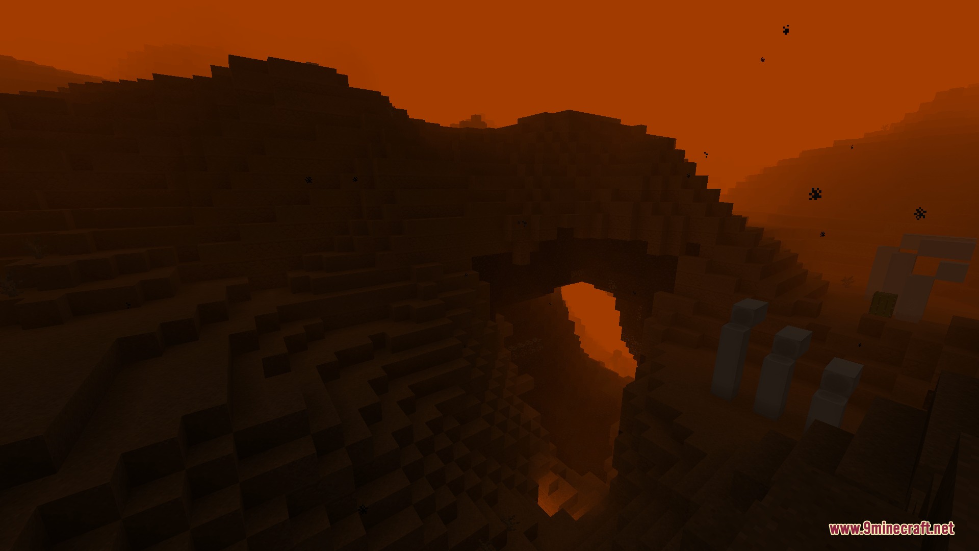 The Purgatory Mod Screenshot 1 Red sand wastes and dark hills under a hazy orange sky