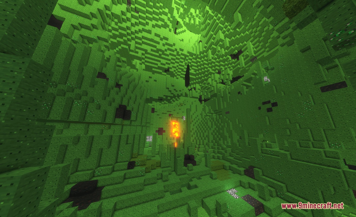The Village Fights Back Mod Screenshot 5 A massive underground cavern filled with green blocks and a glowing fire source