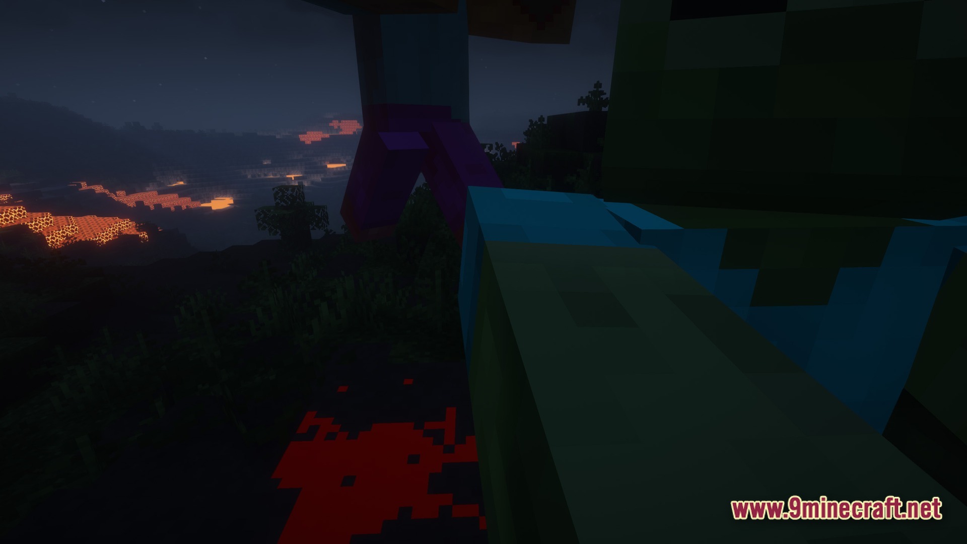 A first-person view of a zombie attacking a player at night near a lava-filled landscape