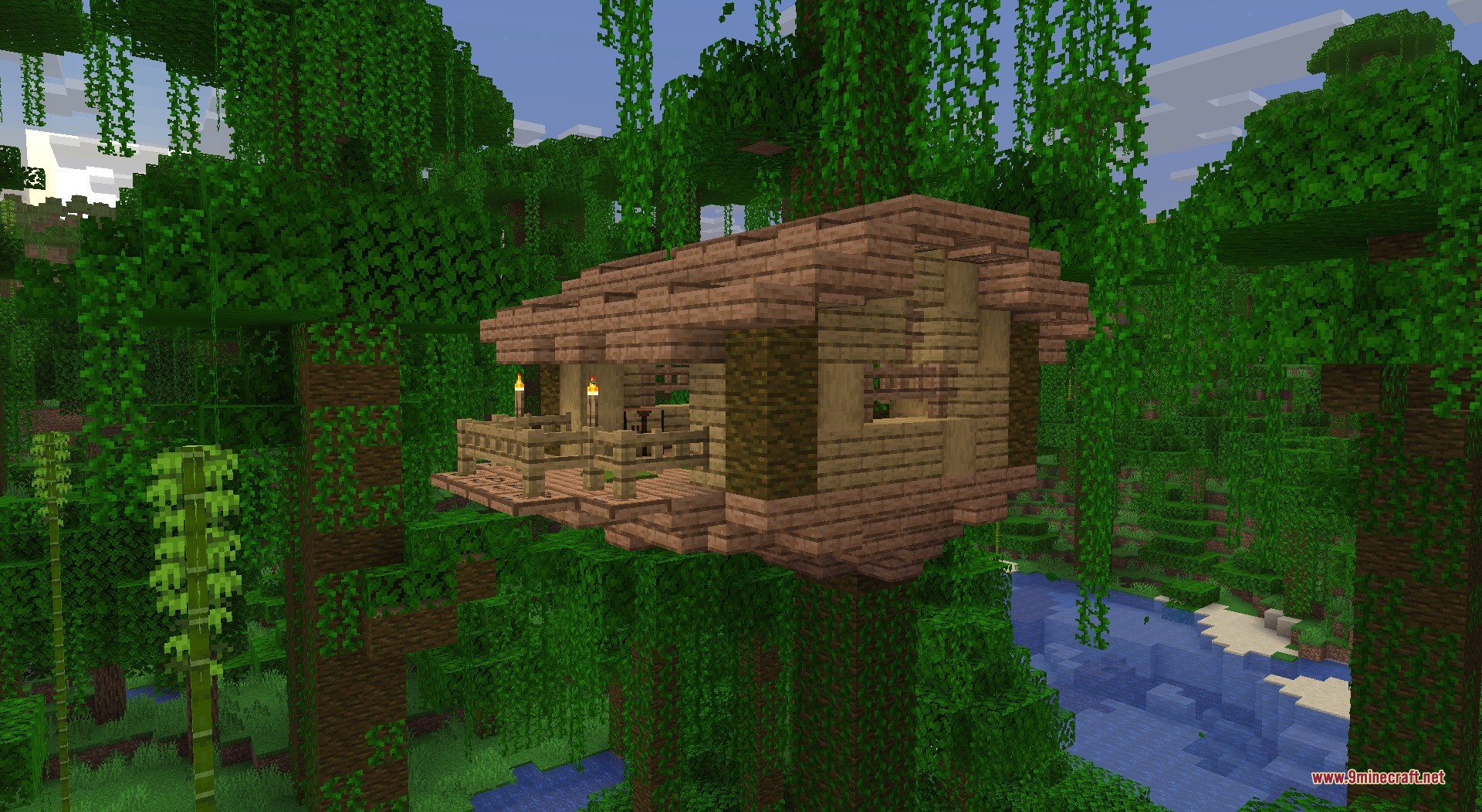 Thun's Structures Data Pack Screenshot 5 A wooden jungle treehouse overlooking a river in a dense jungle biome