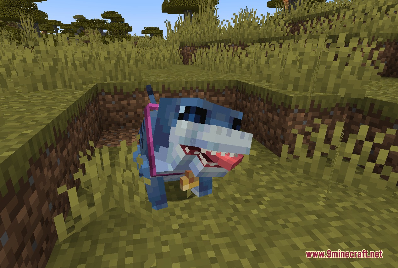 Tidal Crawler Companion Mod Screenshot 1 Jeff the Landshark sits in a dirt pit wearing a pink harness