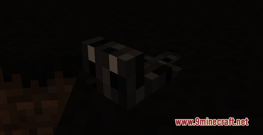 Tidal Crawler Companion Mod Screenshot 7 A small landshark pet sitting on the ground in a dark area