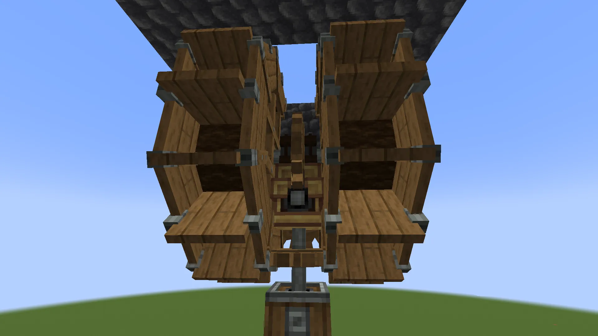 Iron Farm Schematic Screenshots 1 Two large wooden water wheels providing power to a mechanical system