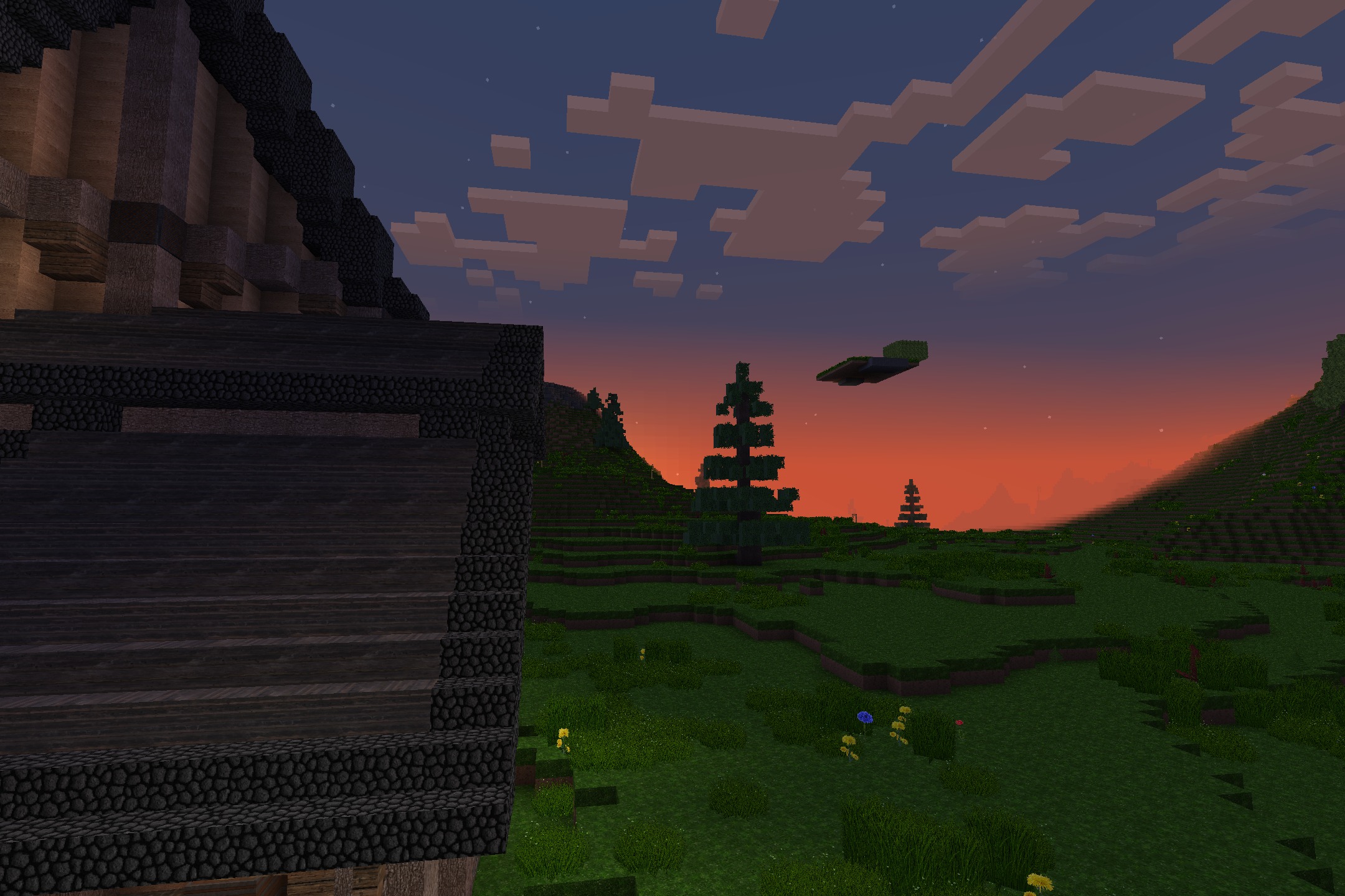 A sunset view over a grassy field featuring realistic trees and hills