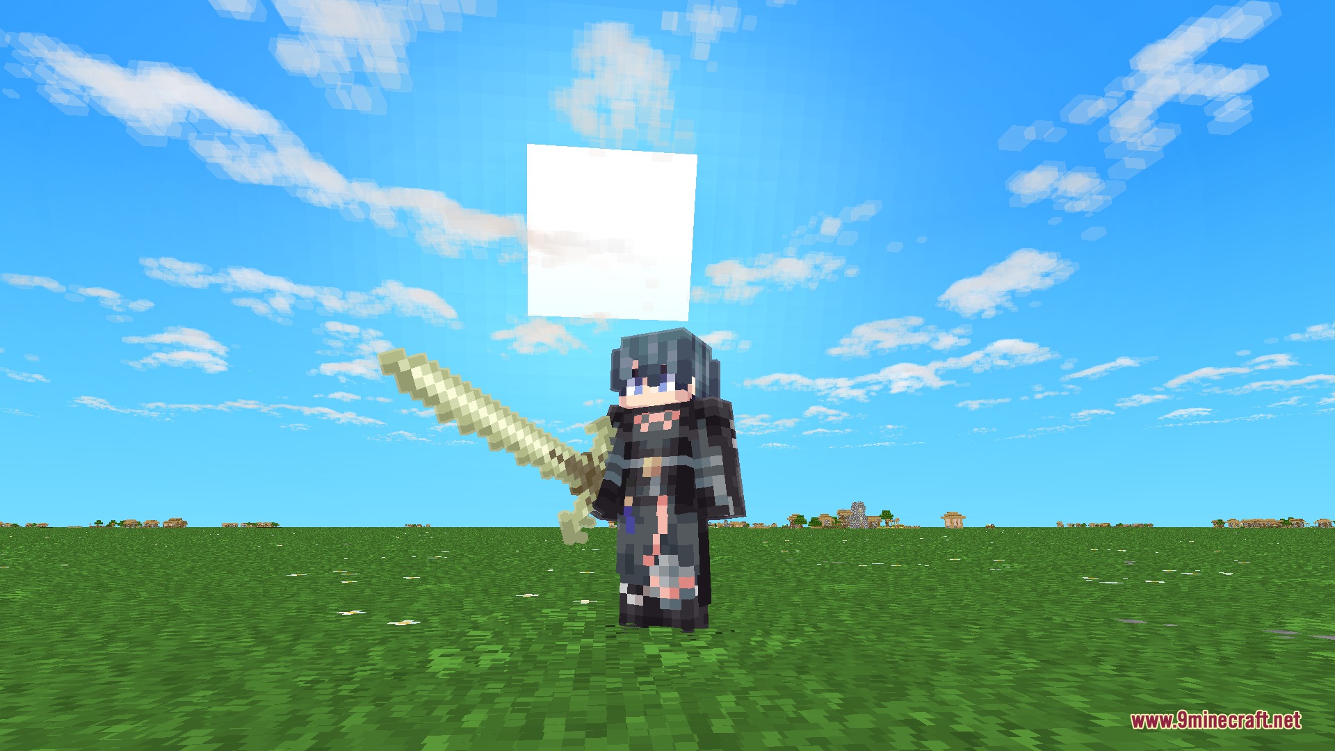 Player character wielding the Sword of the Creator in a grassy field