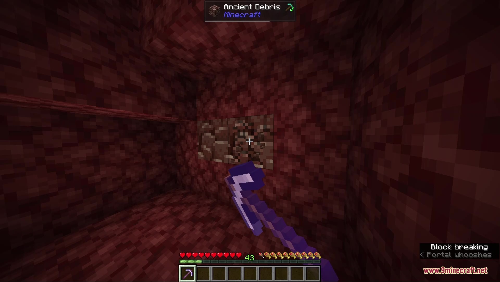 Uncharted Arcana Mod Screenshot 4 Player mining Ancient Debris blocks in the Nether with a purple pickaxe
