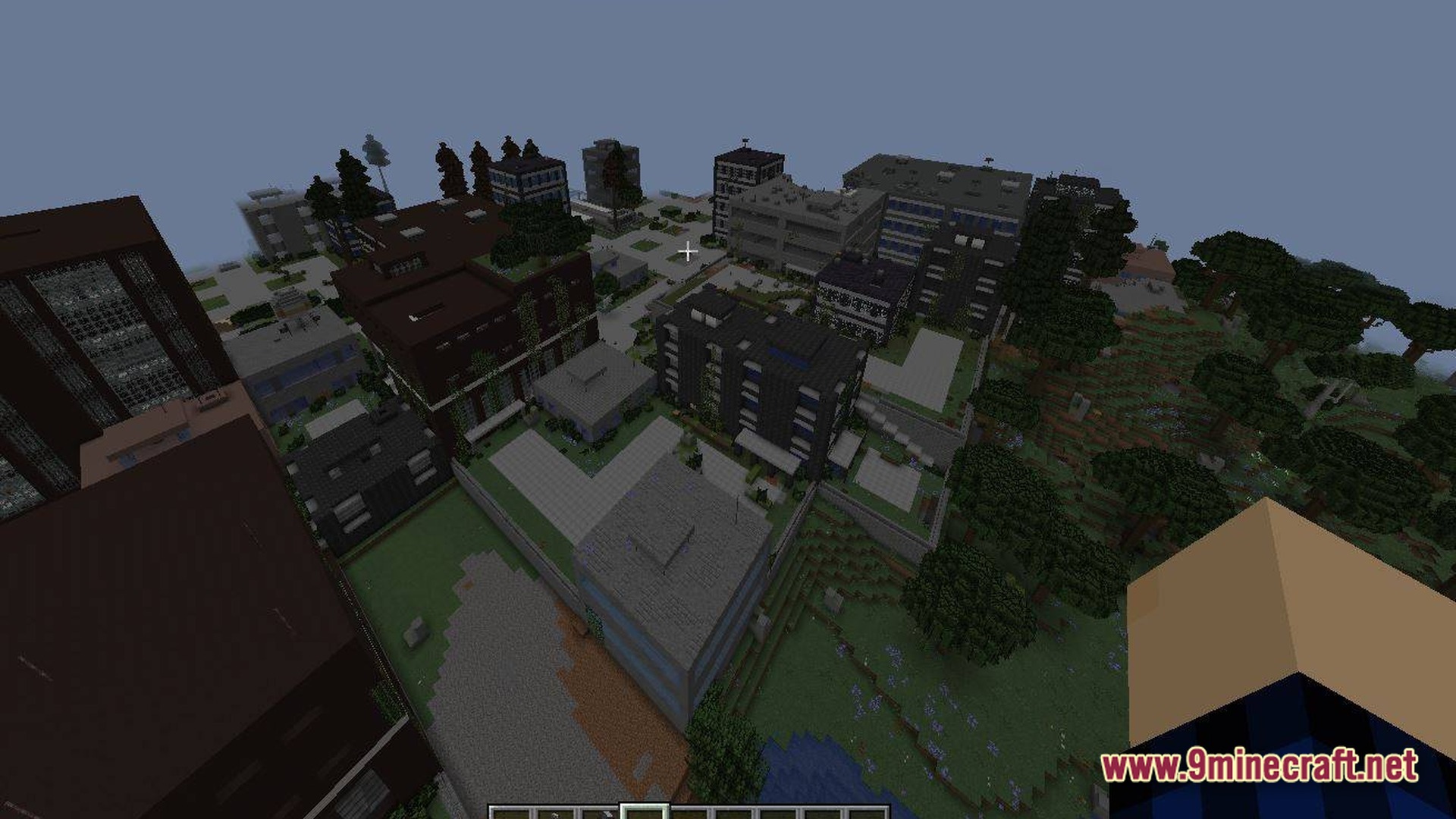 Urban Fracture Nightfall Modpack Screenshot 8 An aerial view of a sprawling urban city environment featuring various modern buildings and paved streets