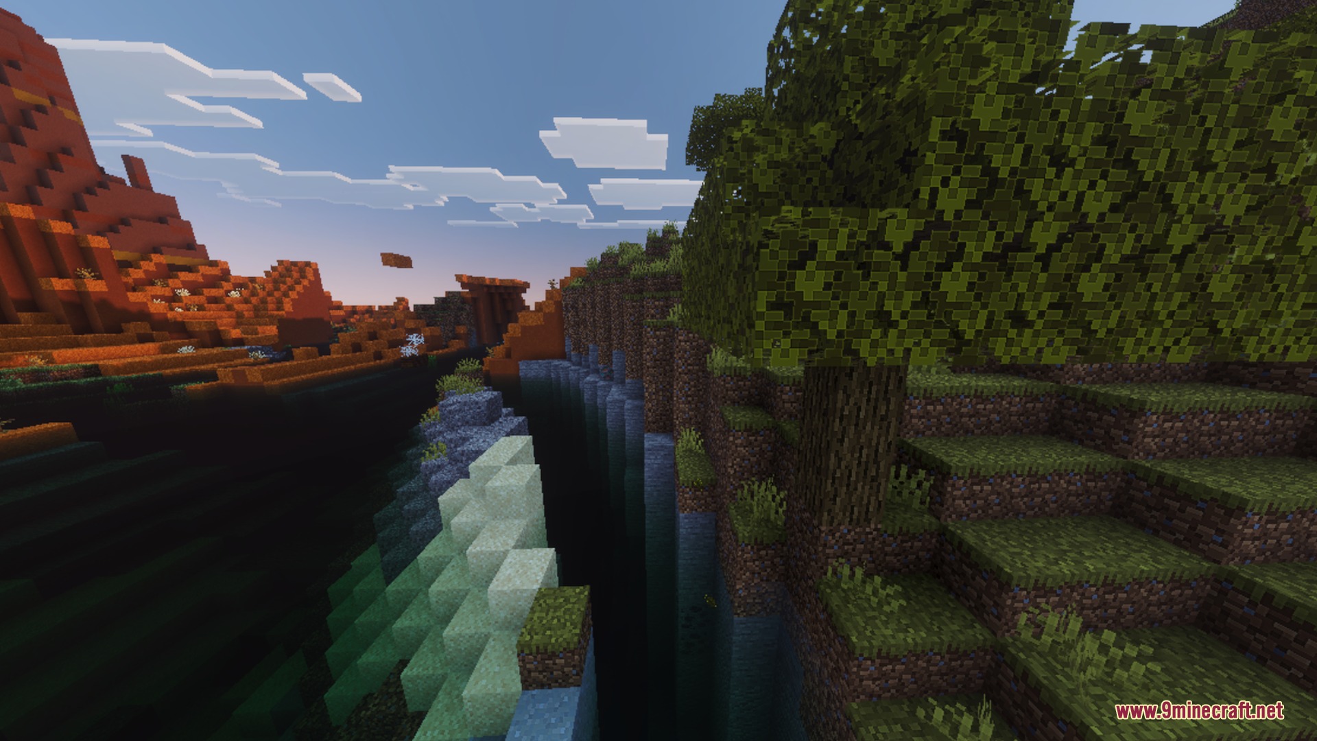 VFX VISUALS Shader Screenshot 9 A lush tree stands near a deep ravine overlooking a colorful mesa biome