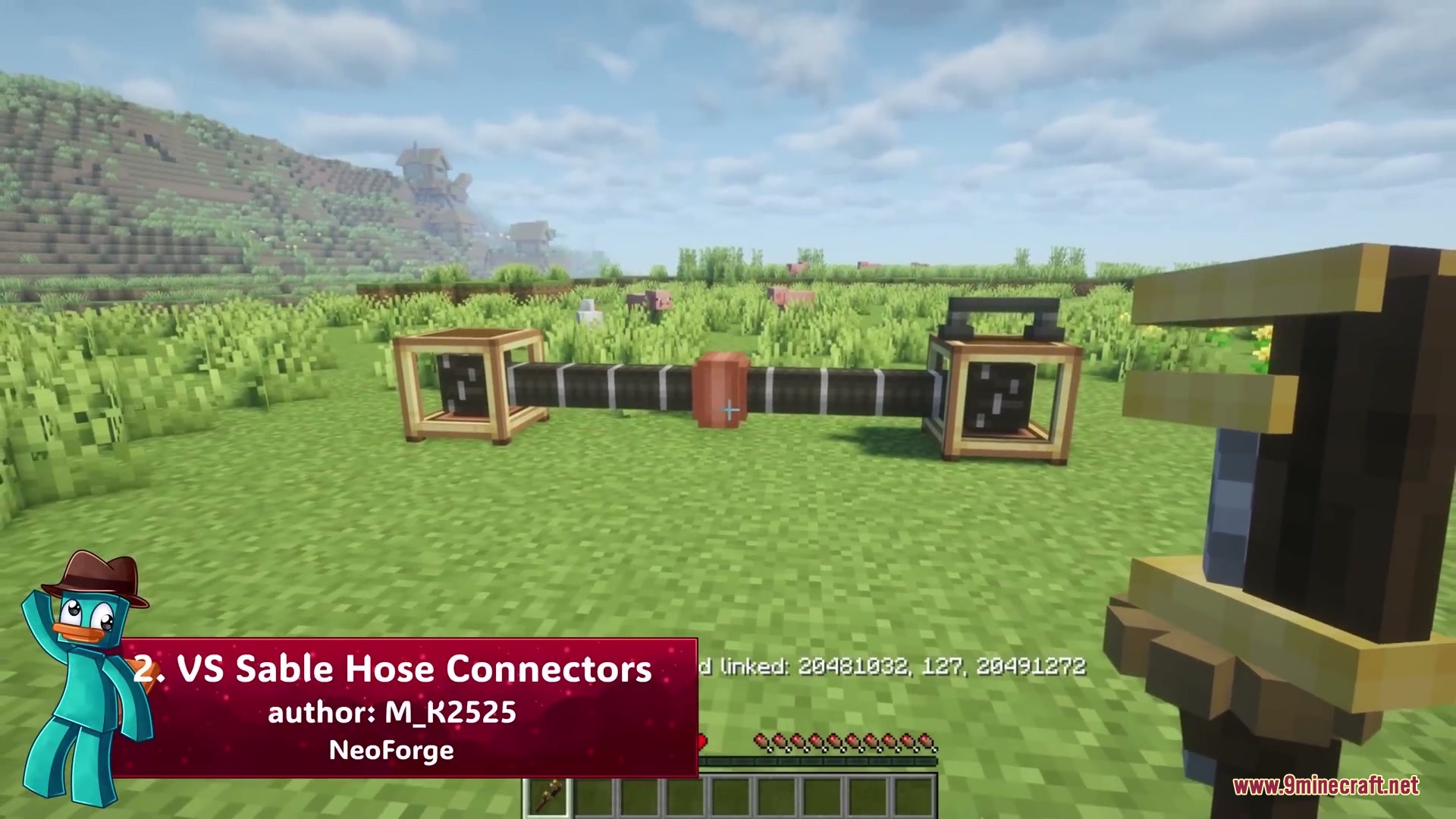 VS Sable Hose Connectors Mod Screenshot 1 VS Sable Hose Connectors linking two blocks across a grassy field in Minecraft