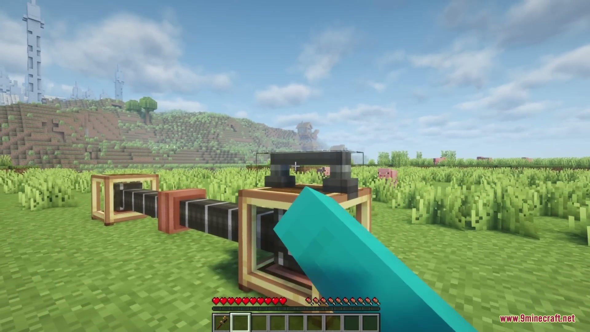 VS Sable Hose Connectors Mod Screenshot 2 A player stands near a hose connection between two resource transfer blocks