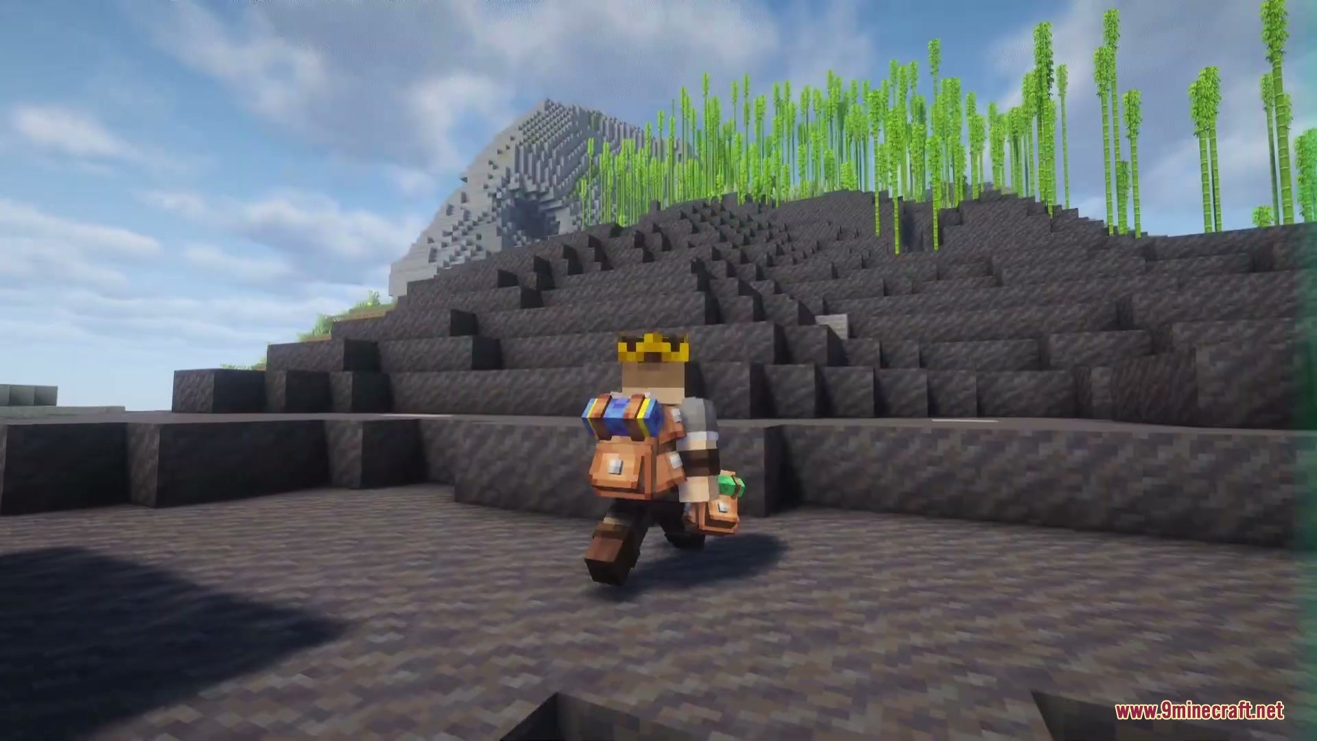 Vagabond Cargo Mod Screenshot 1 A Minecraft player wearing a crown and a backpack walks across dark terrain