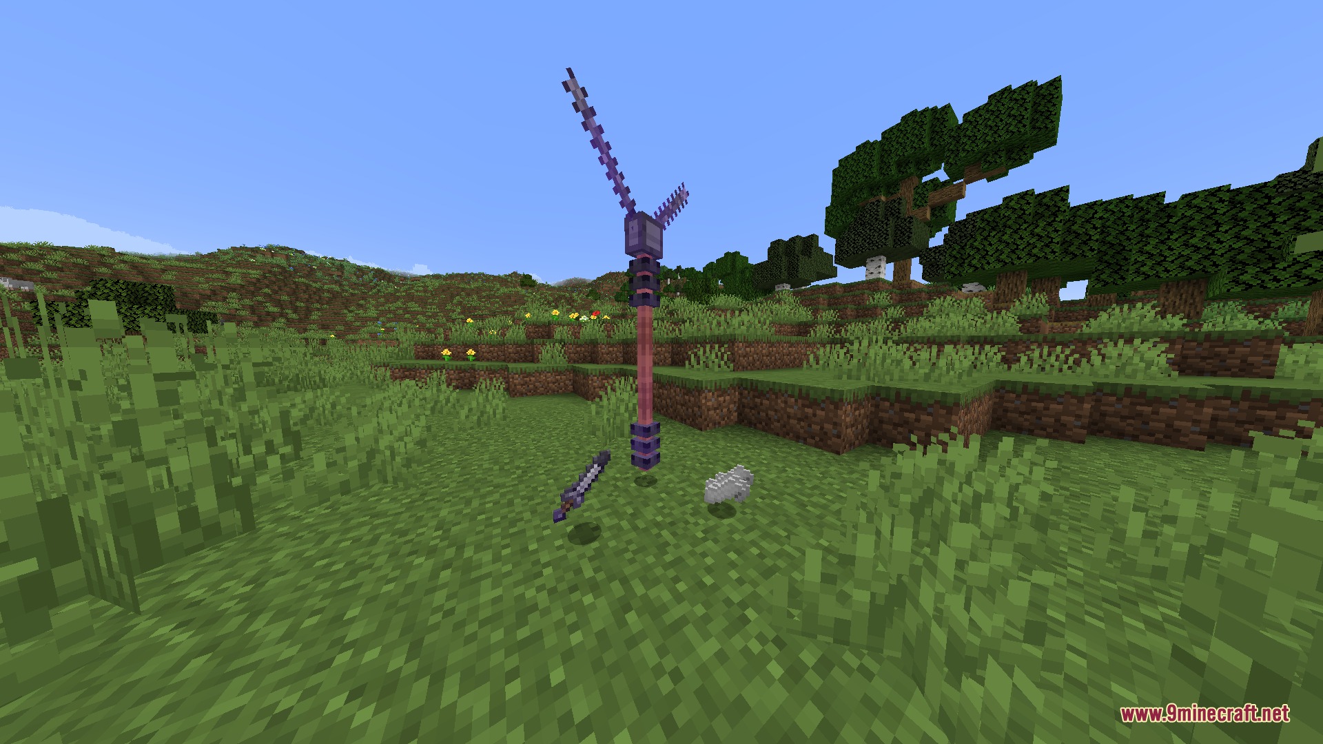 Vanguard of the Abyss Mod Screenshot 1 A tall purple spear stands on the grass with other dropped items