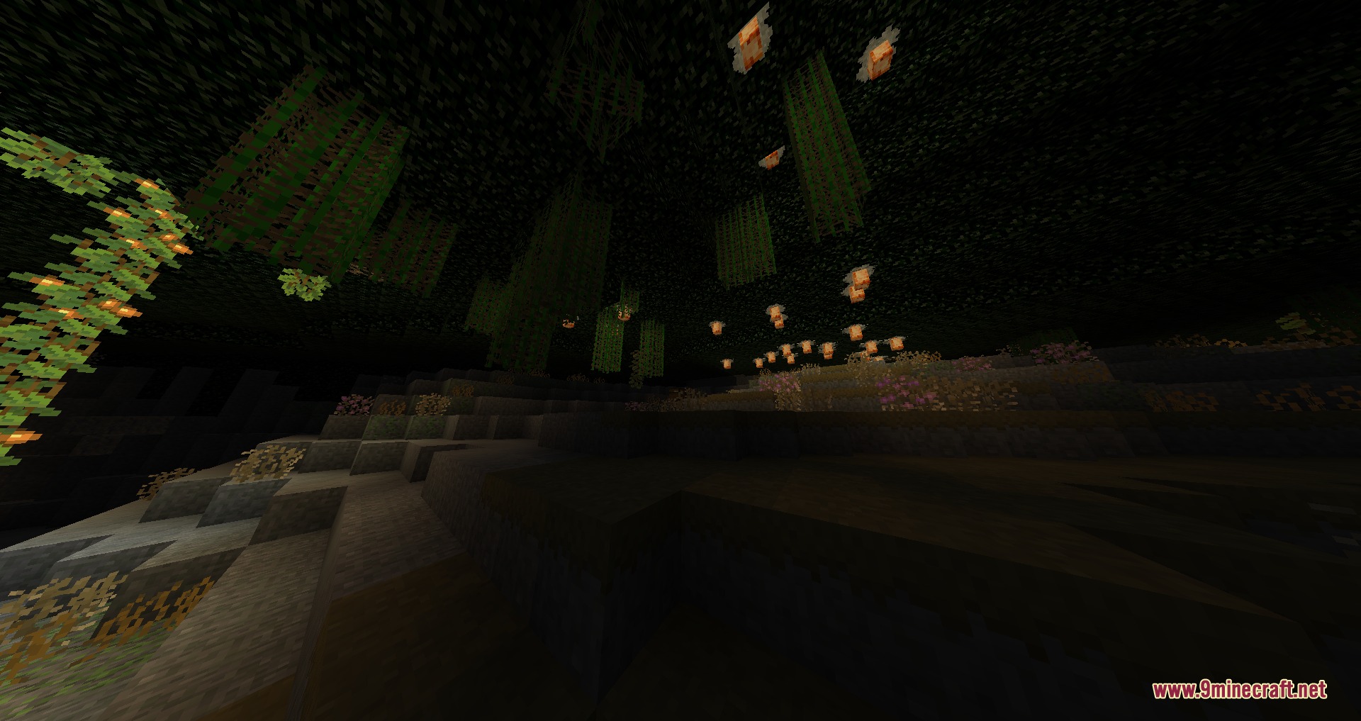 Vanguard of the Abyss Mod Screenshot 4 Lush underground biome with glowing orange plants and vines hanging from the ceiling