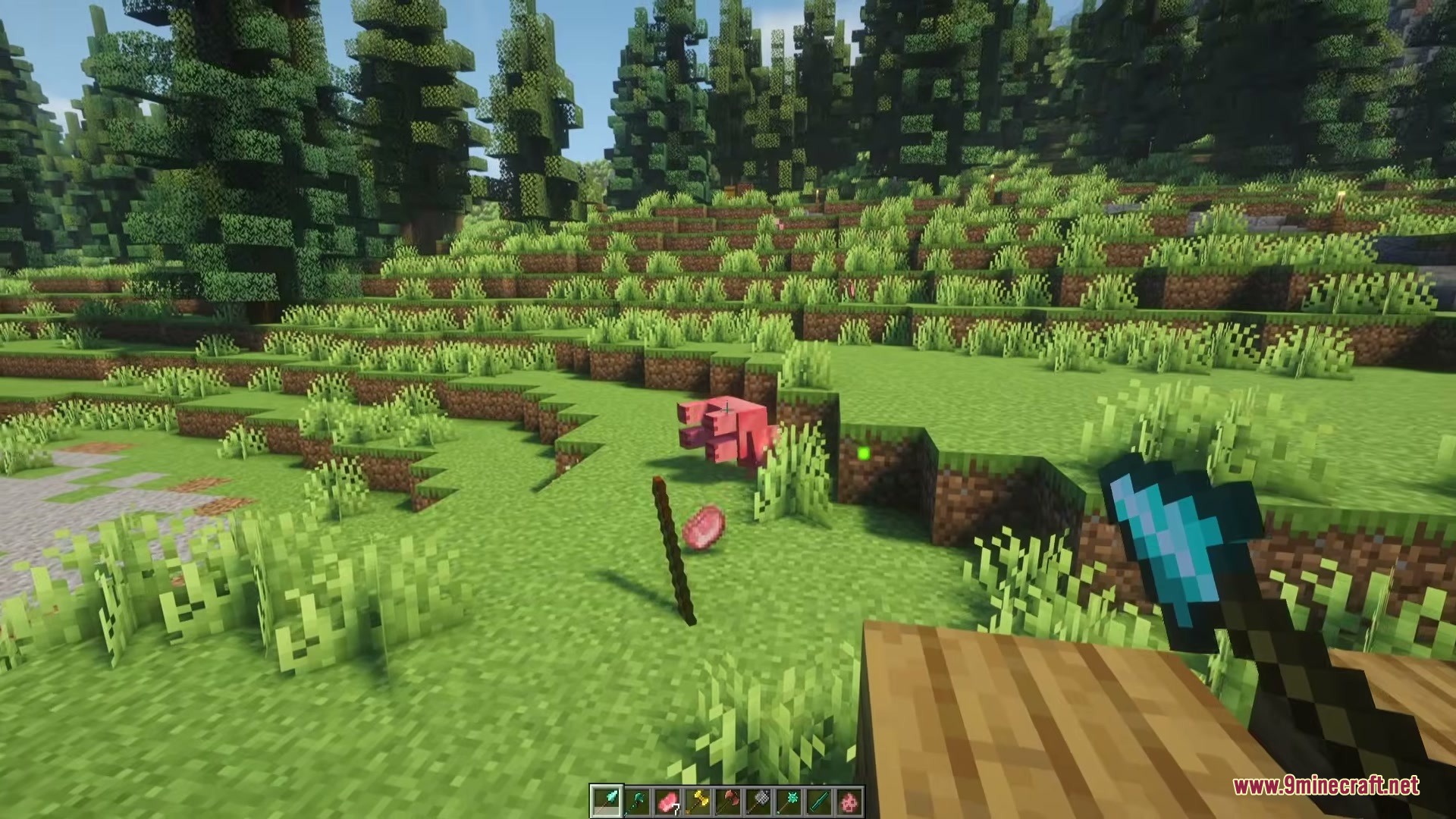 Vanilla Armory Mod Screenshot 6 First person view of a player holding a diamond spear in a forest