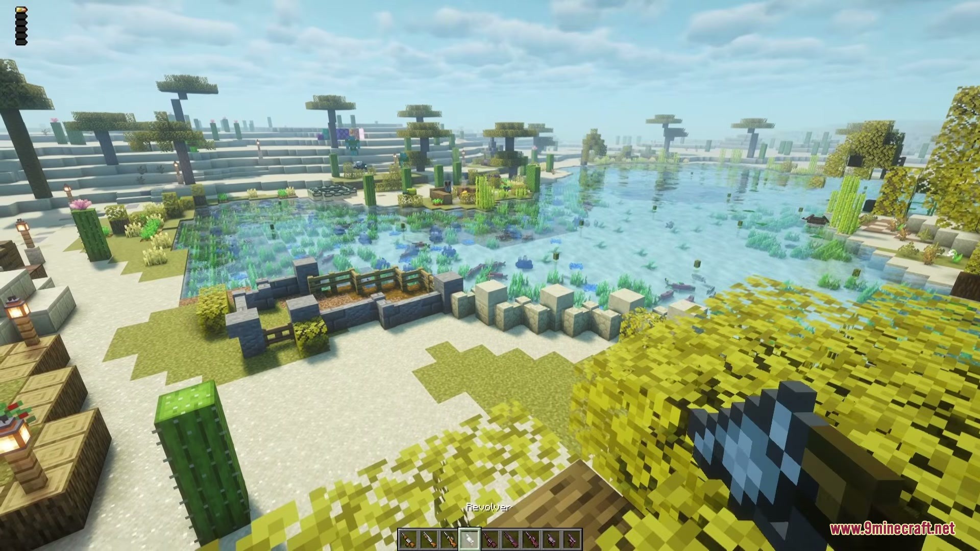 Vanilla Gun Mod Screenshot 3 A player holds a revolver while standing near a pond in Minecraft