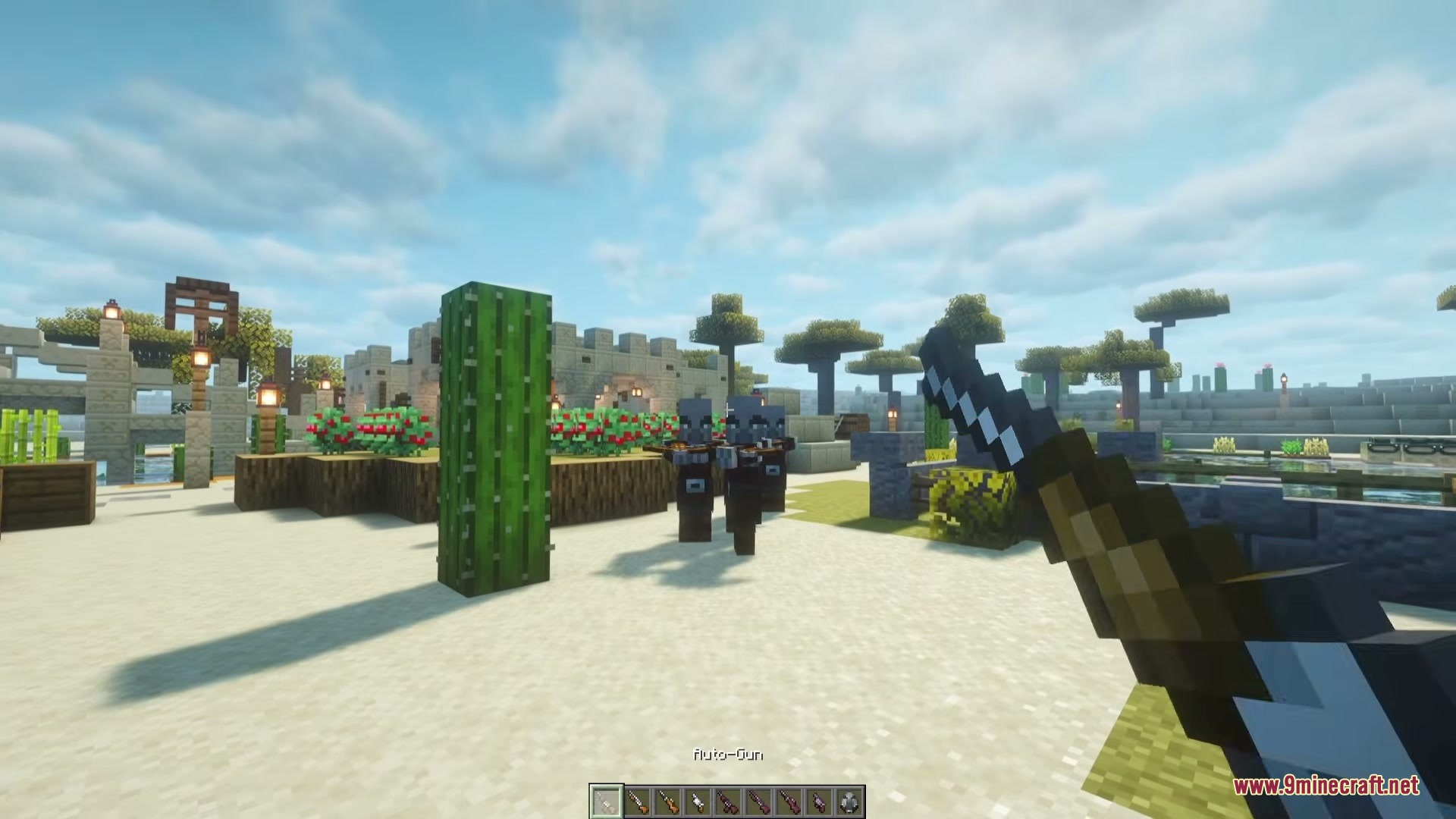 Vanilla Gun Mod Screenshot 4 Player aiming an auto gun at several pillagers in a desert village