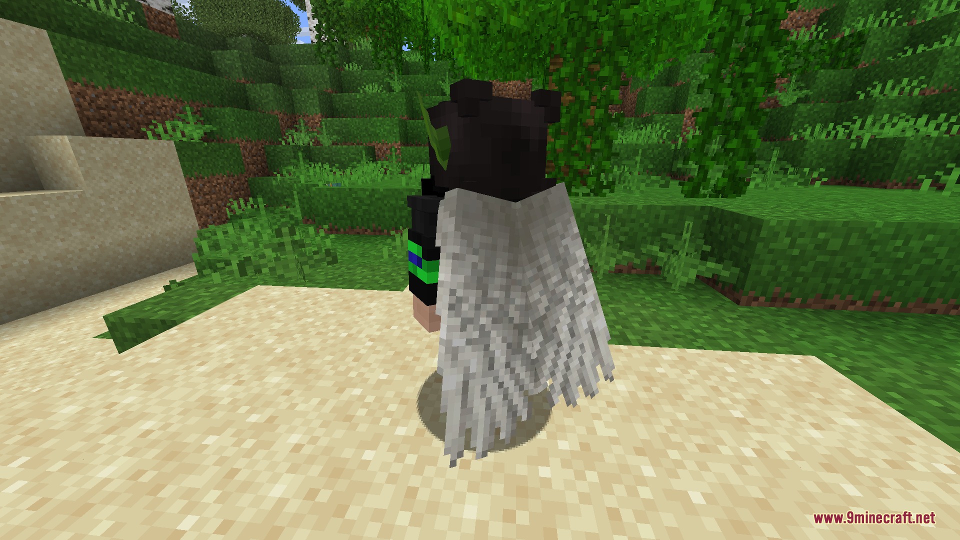 Vanilla Reborn RP by Guonith Resource Pack Screenshot 7 A player character wearing white angel wings standing on a sandy beach area