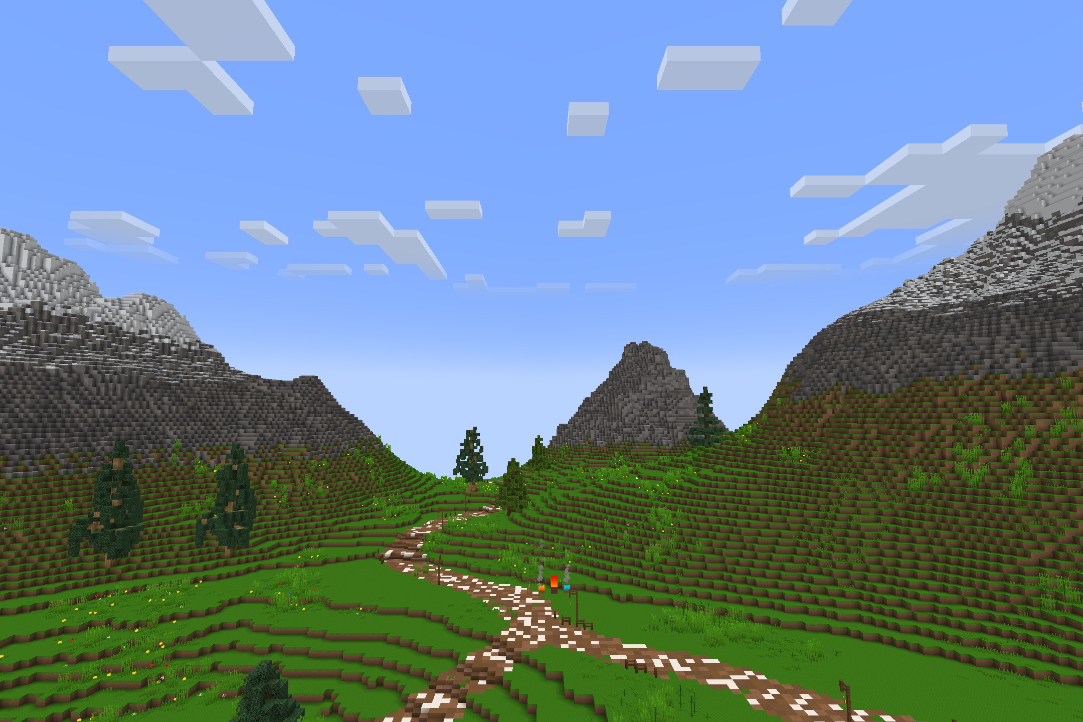 VanillaEnhanced Resource Pack Screenshot 10 A scenic green valley with a winding path between tall mountains and trees
