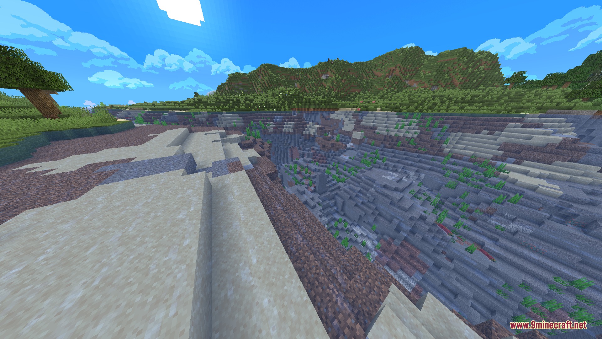 Vantage Point Clarity Resource Pack Screenshot 3 A vast Minecraft landscape featuring a deep ravine and a custom sky texture
