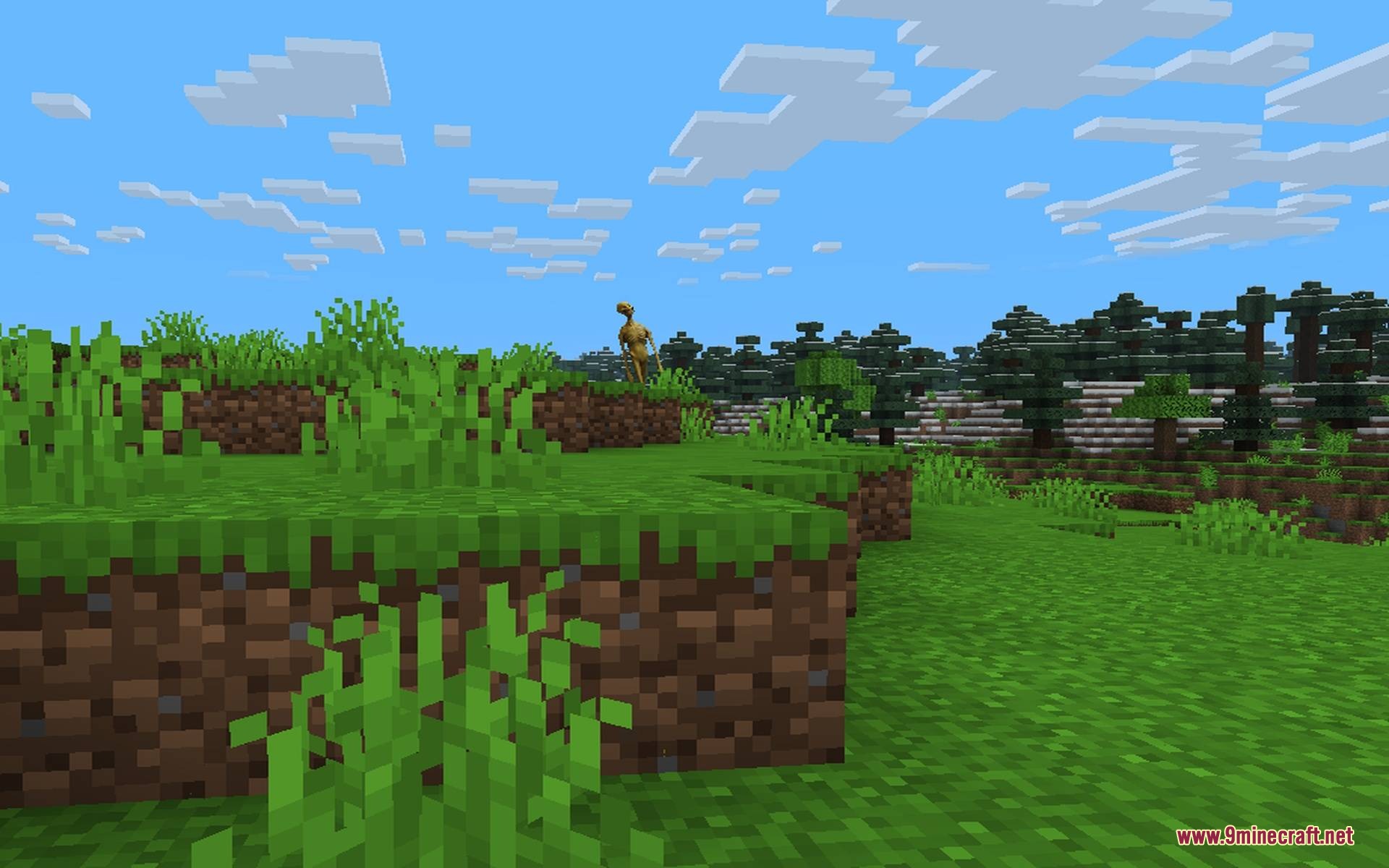 Verity Better Body & Animations Mod Screenshot 1 A tall yellow Verity Demon stands on a grassy hill in Minecraft