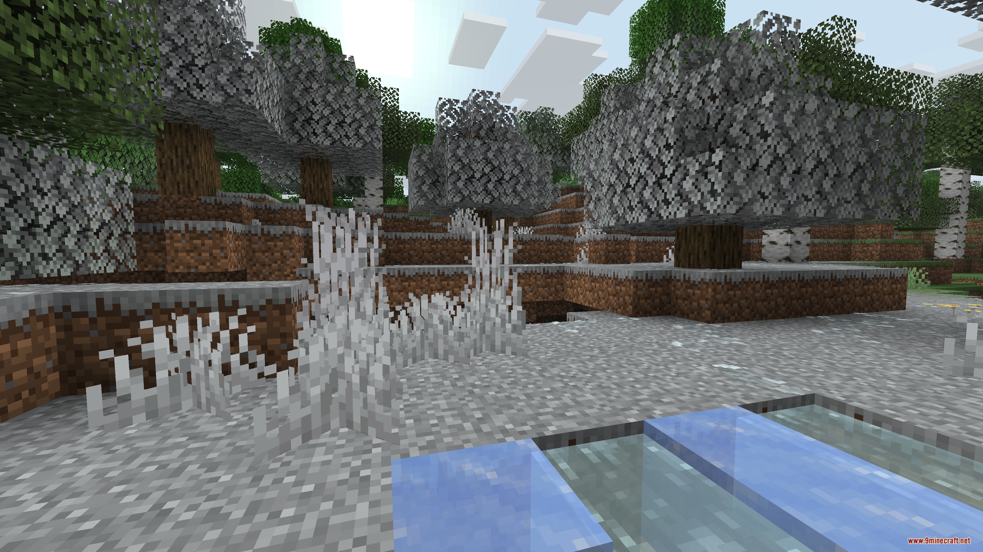Vibrant Sundries Mod Screenshot 4 Frozen winter forest landscape with white grass and ice blocks in the pond