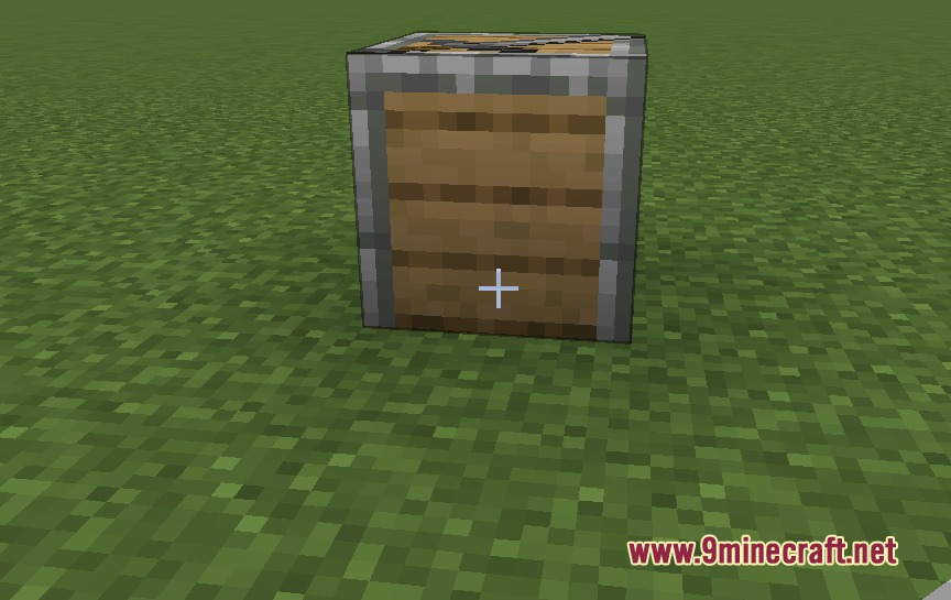 Villager Recruits Village Expansion Mod Screenshot 2 A wooden Recruit block with a metal frame placed on green grass