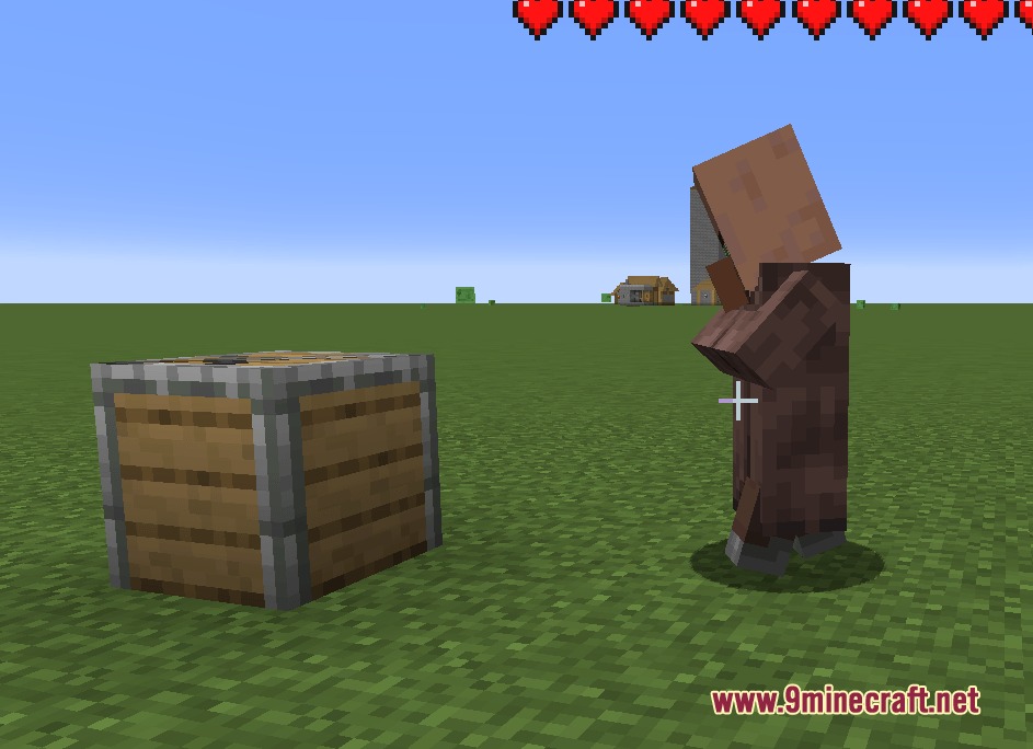 Villager Recruits Village Expansion Mod Screenshot 3 A villager wearing a box on its head stands next to a crate