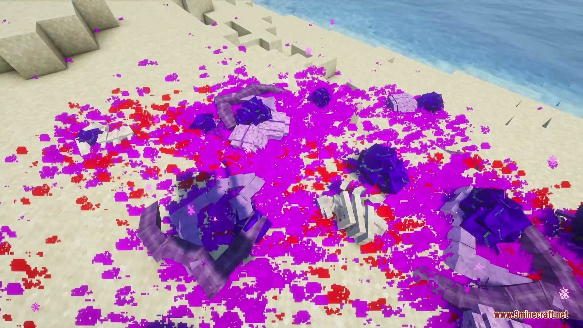 Visceral Remains Mod Screenshot 4 Purple blood and organs scattered across the sand after defeating an Enderman
