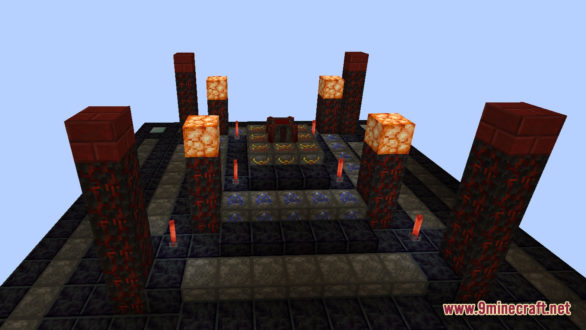 Vital Kinetic Rituals Modpack Screenshot 7 A Blood Magic altar structure featuring tiered runic blocks, glowstone pillars, and blood-red decorative elements