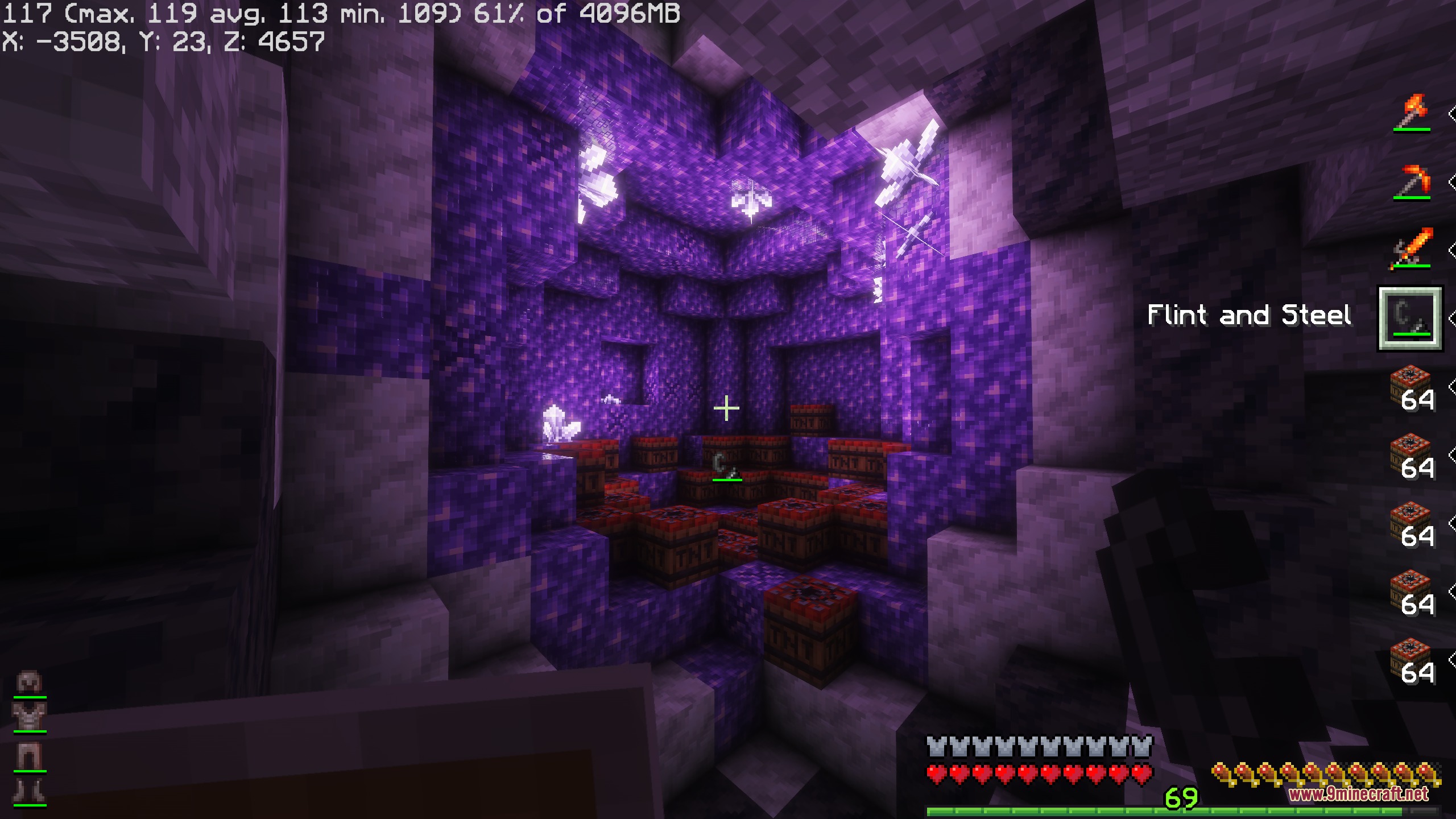 Vivid Interface Designer Mod Screenshot 1 Player holding flint and steel near TNT blocks inside a purple amethyst geode